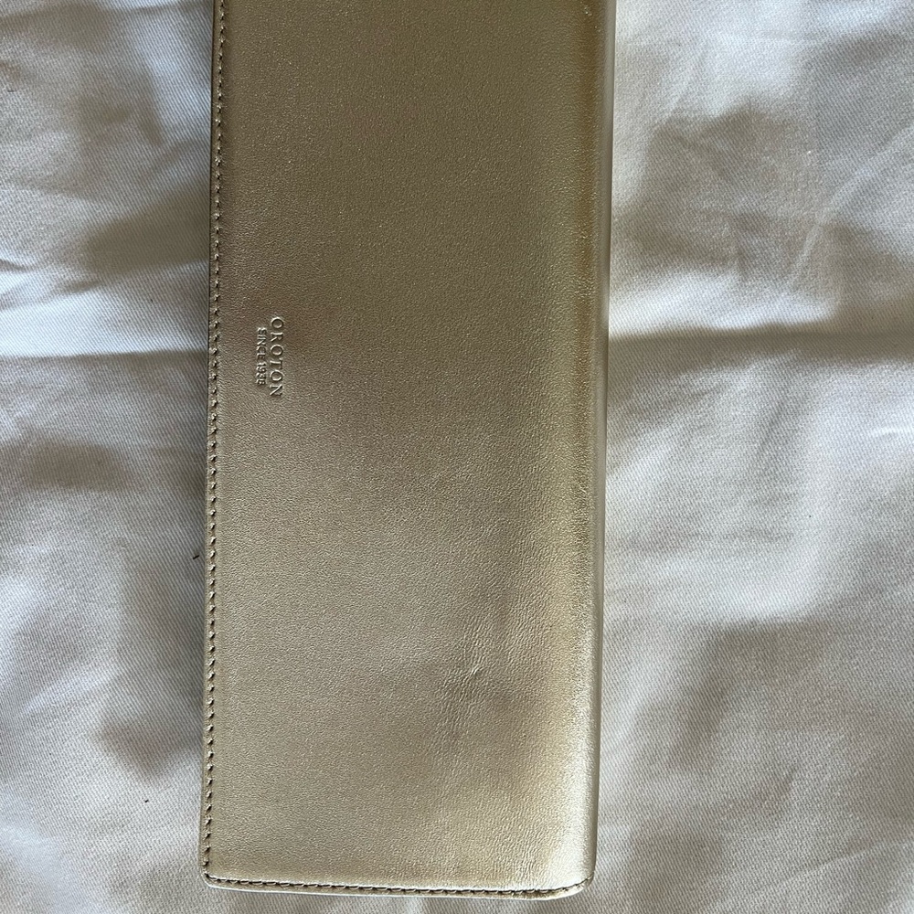 Oreton champagne gold clutch